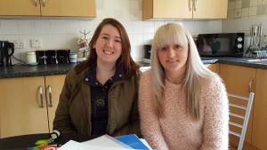 Darlene and Amy sitting in a kitchen