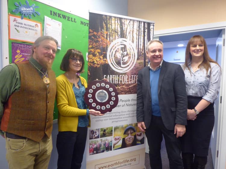 Anne receiving the James Hill Learner of the Year Award