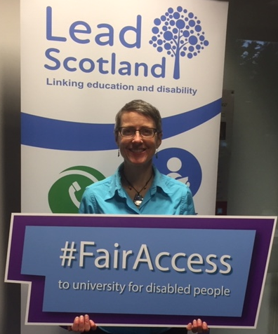 Emma Whitelock, CEO Lead Scotland holding the #FairAccess campaign banner