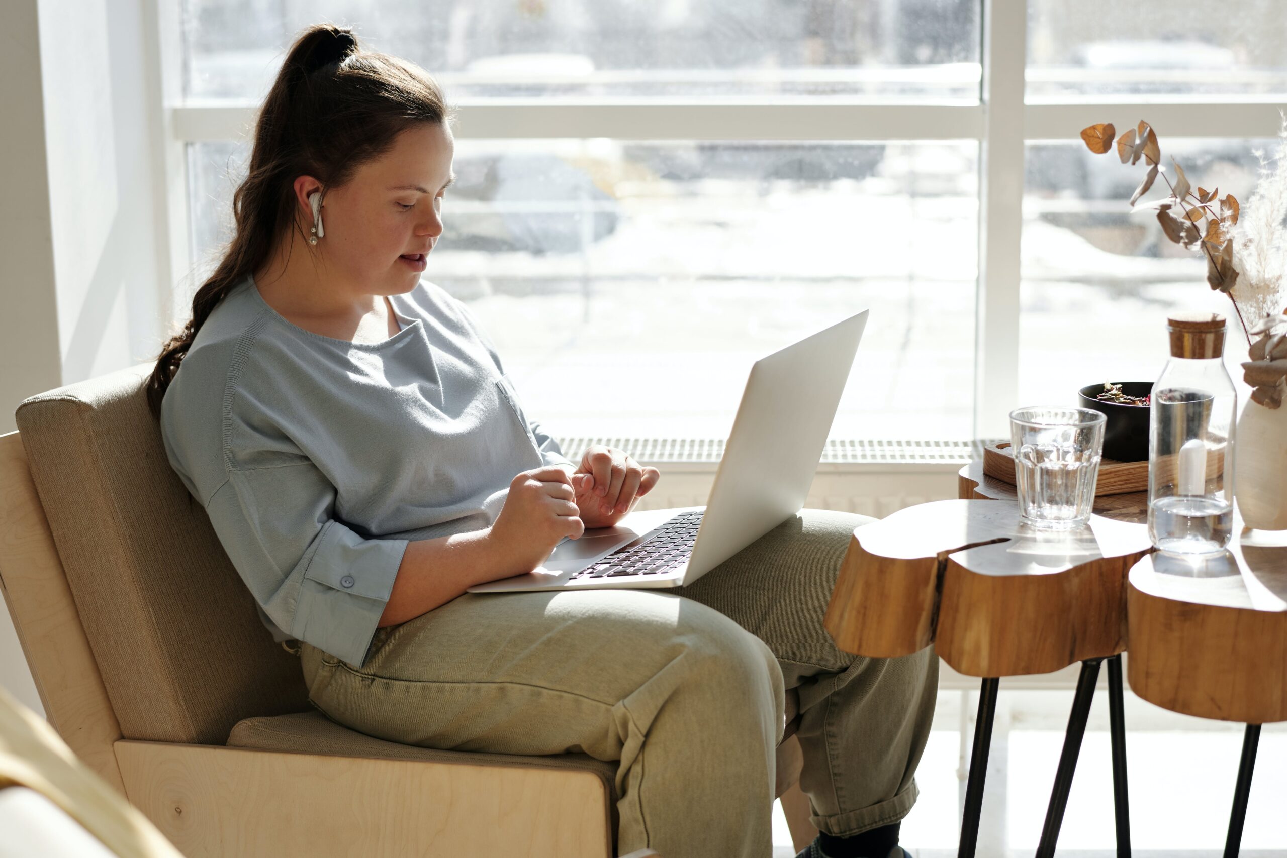 
    Woman looking at laptop