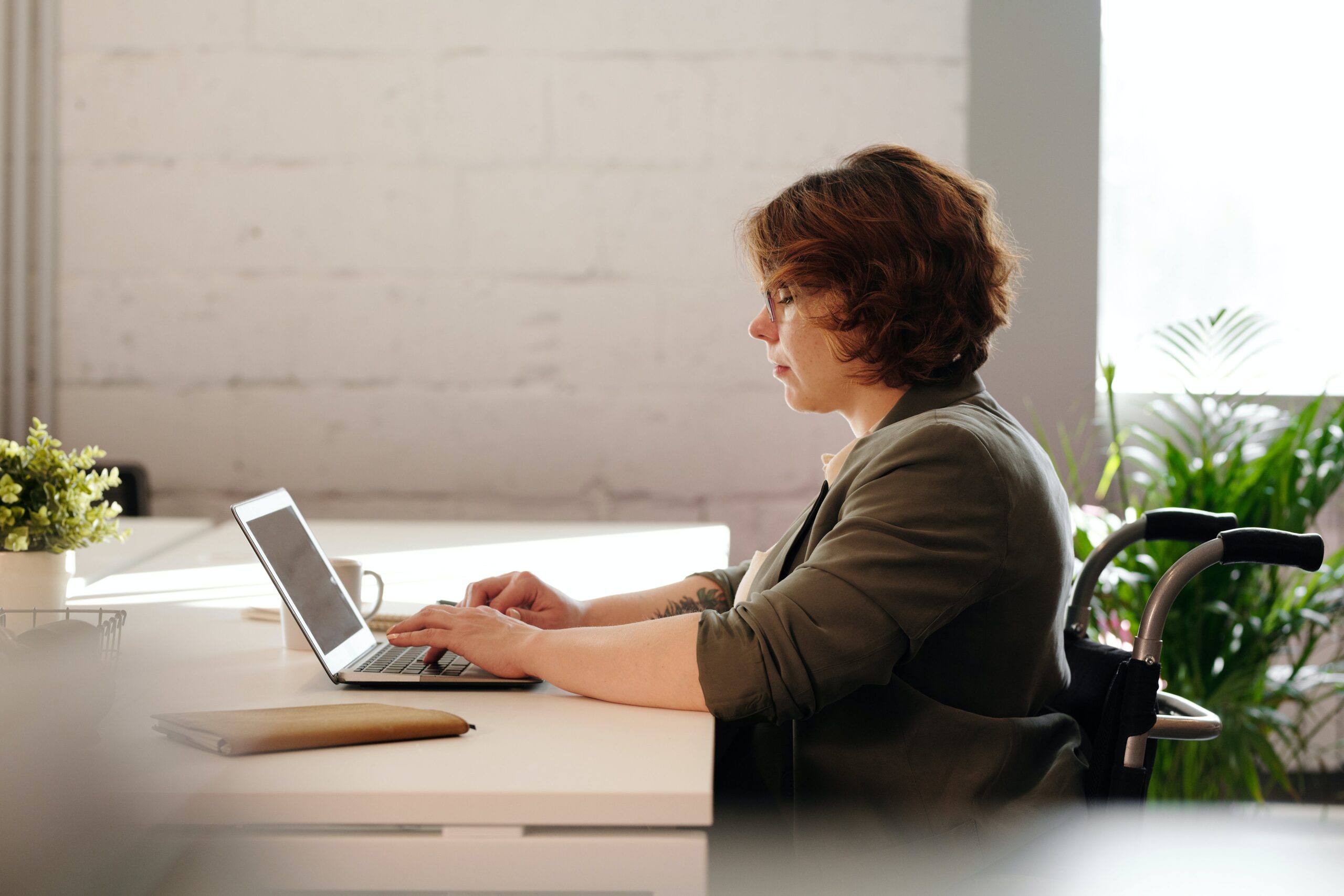     A female using a computer at a desk