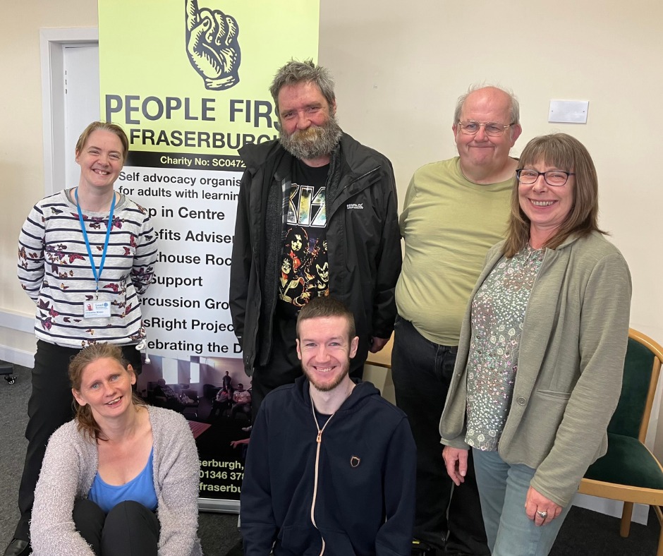 
    Two members of Lead Scotland Staff with a group of learners