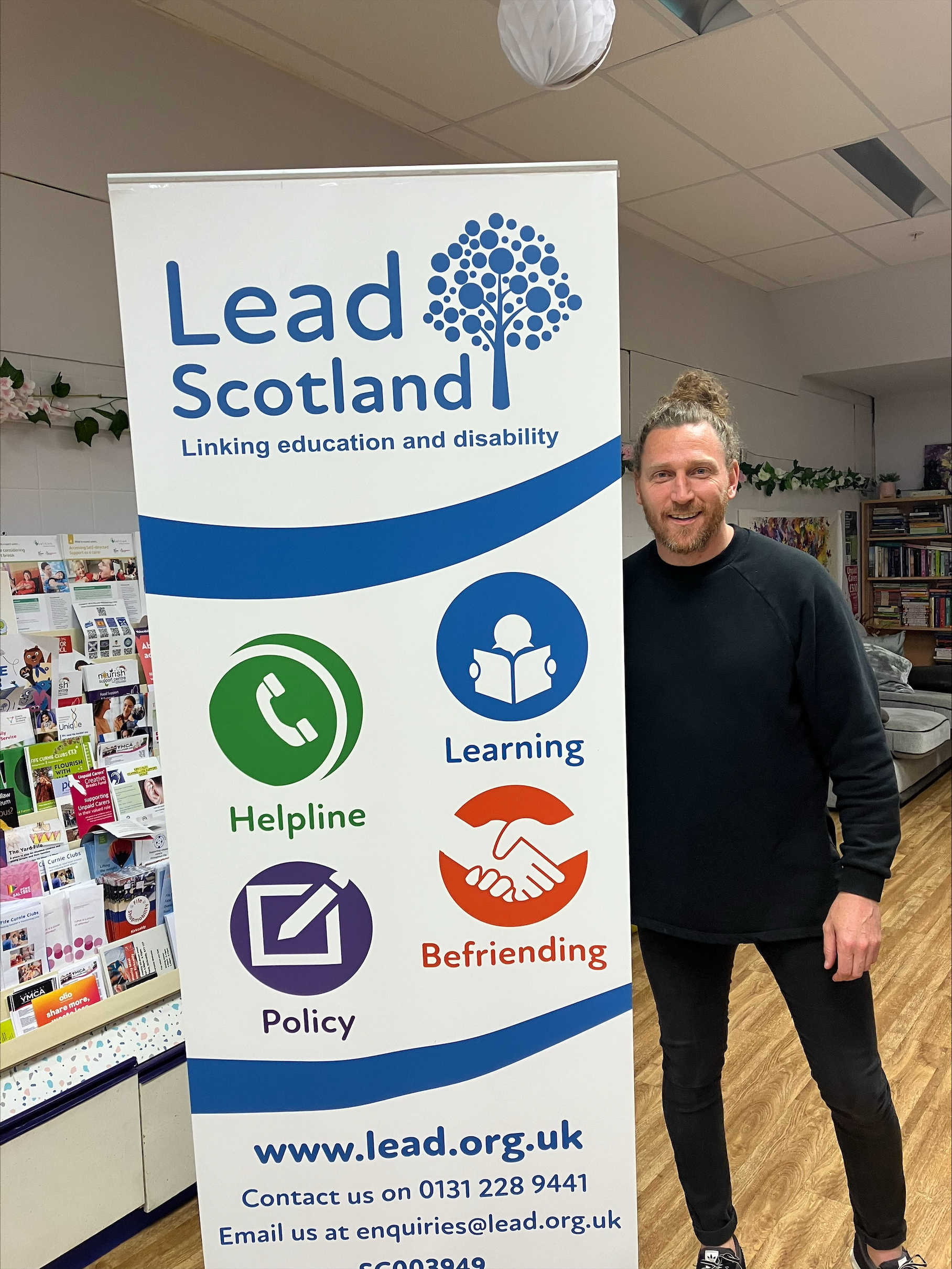     Lead member of staff with a banner